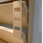 Стильное и практичное решение в виде двухъярусной кровати