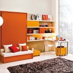 Диван-кровать оранжевого цвета для спальни