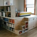 Кровать-подиум с встроенным книжным шкафом