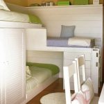 Разноуровневая детская кровать с встроенными шкафами