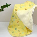 Желто-белое плюшевое одеяло для малыша