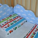 Комплект постельного и защита в детскую кроватку