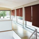 Шторы рулонные коричневого цвета для панорамных окон